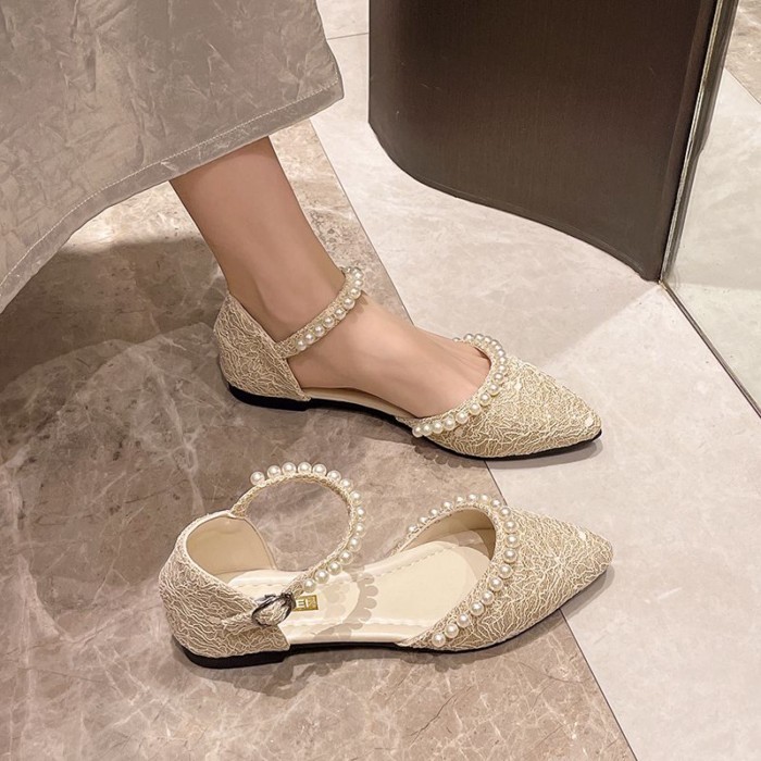 Giày sandal đế bằng một mũi nhọn mùa hè dành cho nữ với giày đế bệt và ngọc trai rỗng thoáng khí