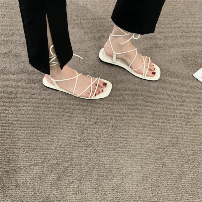 La Mã Giày Sandal Nữ Mùa Hè Ins Đa Năng Đáy Bằng Sinh Viên Phong Cách Hàn Quốc Thiết Kế Quai Cổ Tíc